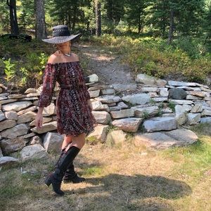 Western dress with off-shoulder styling.